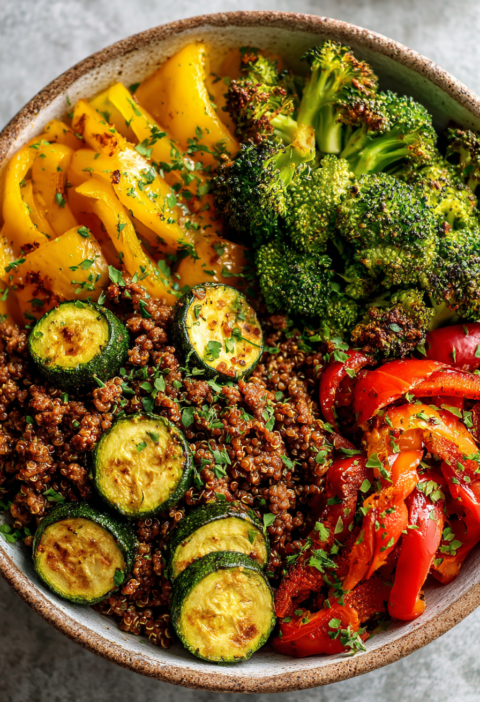 high protein ground beef quinoa bowls with roasted vegetables